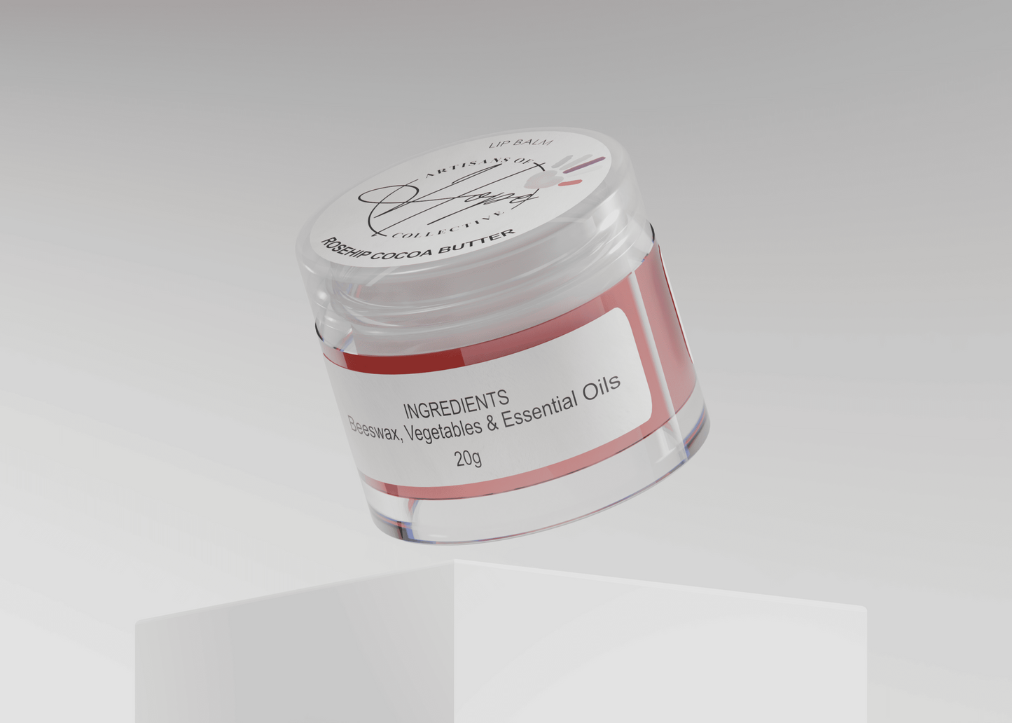 Small white jar with red label on a gray background