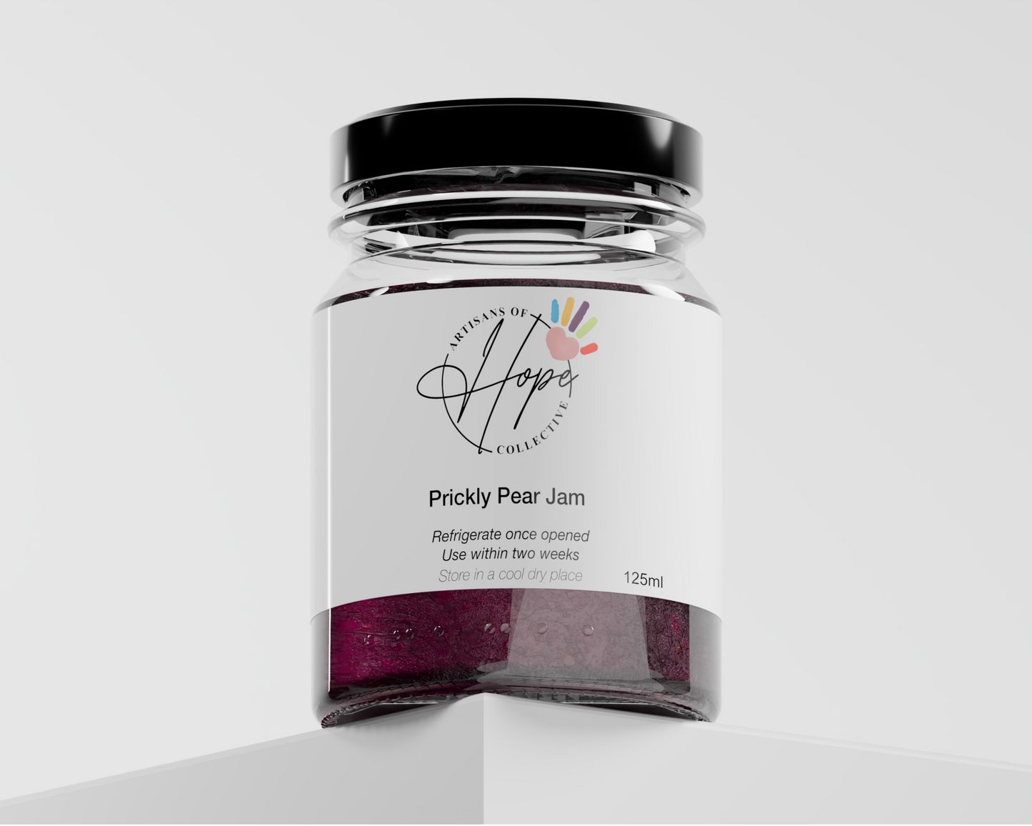 Jar of 'Prickly Pear Jam' with a white label on a light gray background