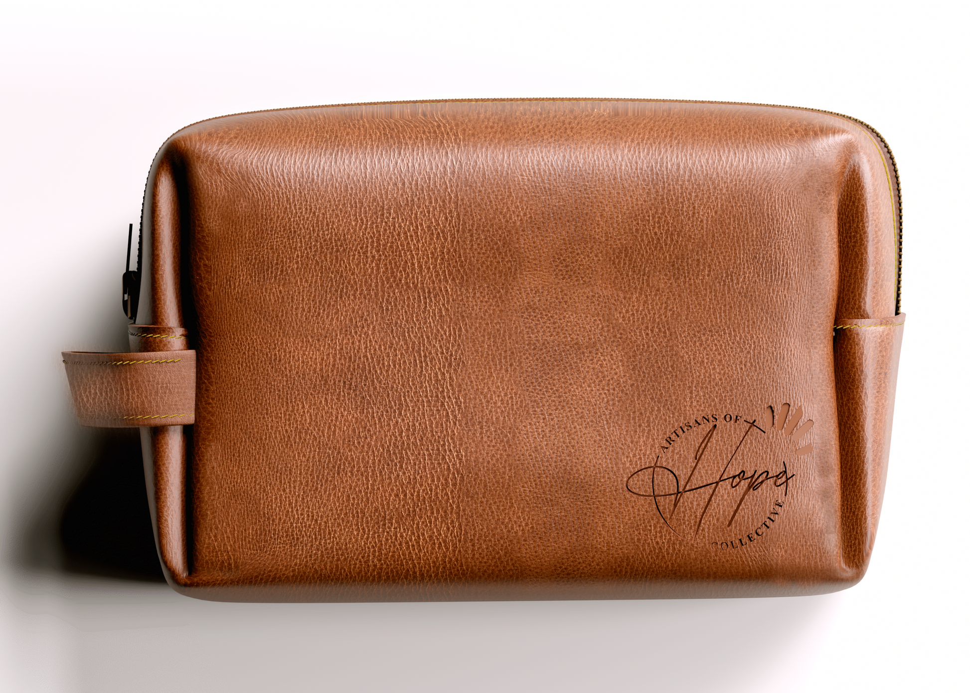 Brown leather toiletry bag with a brand logo on a white background